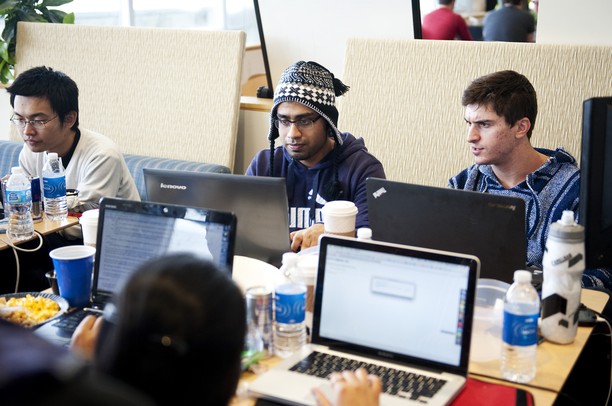 Penn. graduate student Rajib Dutta works with other students in Palmer Commons during the Hackathon part one on Saturday, Feb. 2. Daniel Brenner I AnnArbor.com